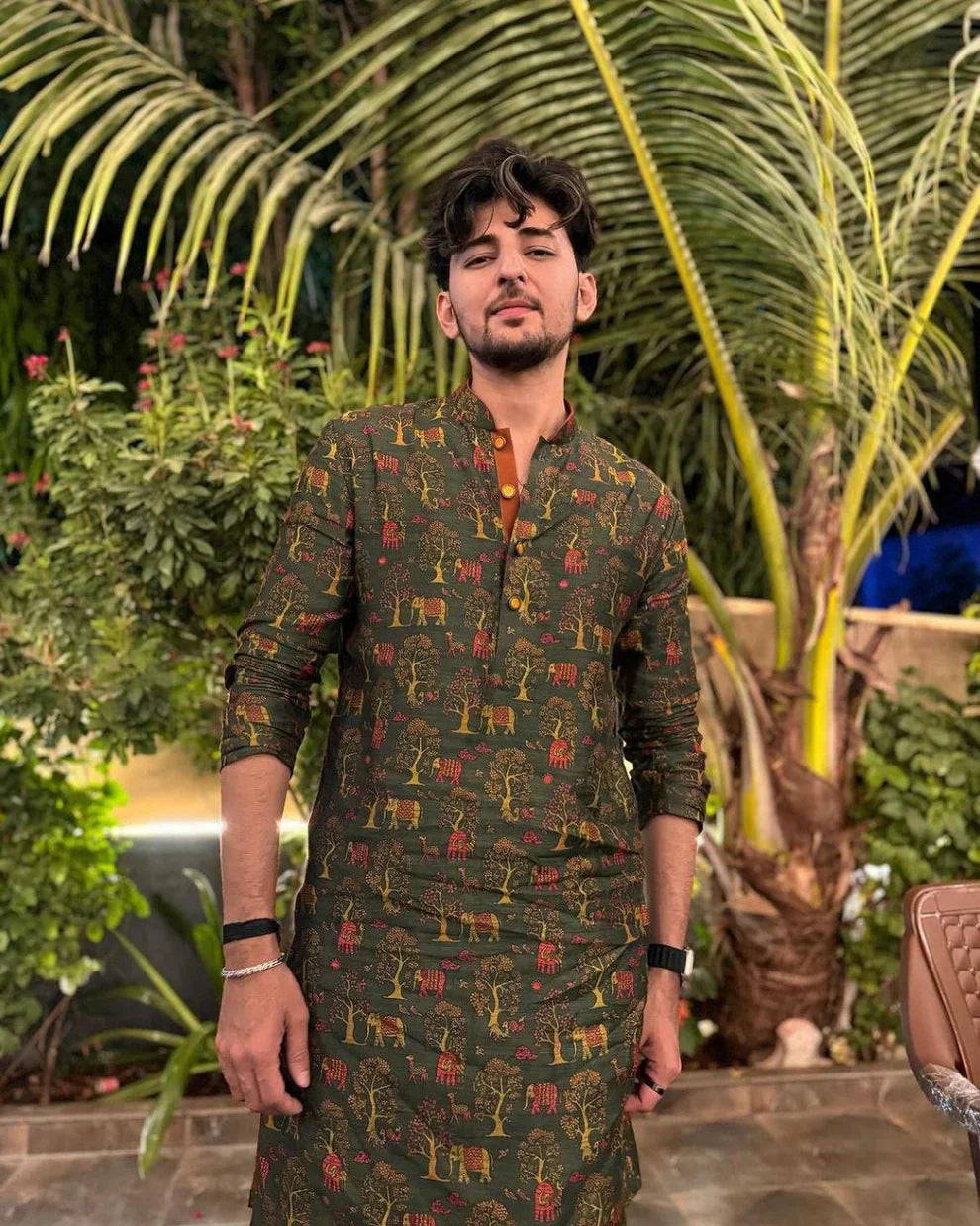 Olive green printed kurta and pajama set by Pravohammenskurta, showcasing traditional style with intricate patterns and comfortable fit.