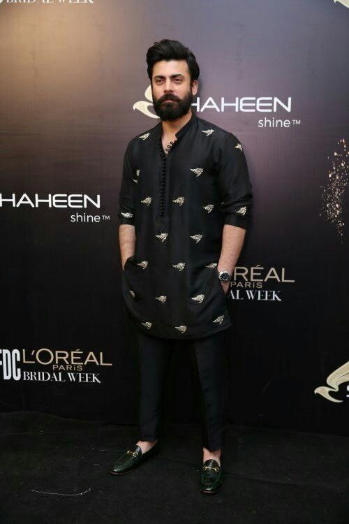 Black embroidered men's kurta with matching pajama, designer party wear attire by Pravo Hammens for weddings and special occasions.