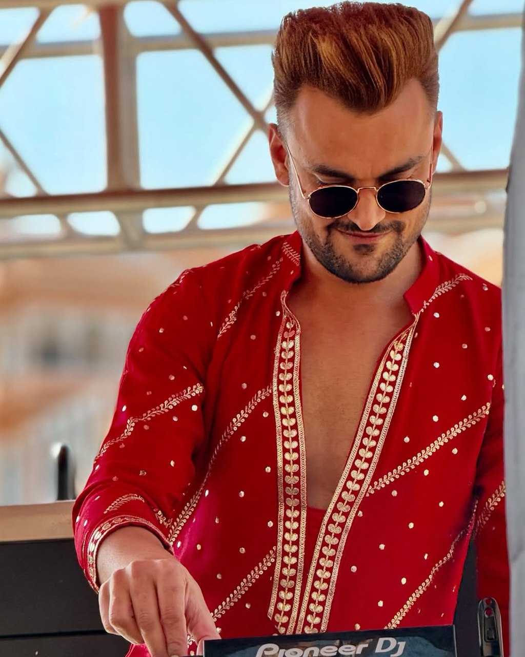 Traditional red embroidered kurta for festive wear