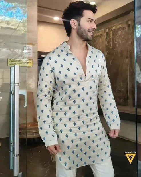 Men's embroidered kurta with intricate motifs from pravohammenskurta, paired with matching pajama for traditional Indian attire.