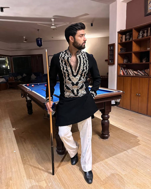 Black men's kurta pajama with stylish neck pattern and embroidered work, by pravohammenskurta, with matching pajama pants.
